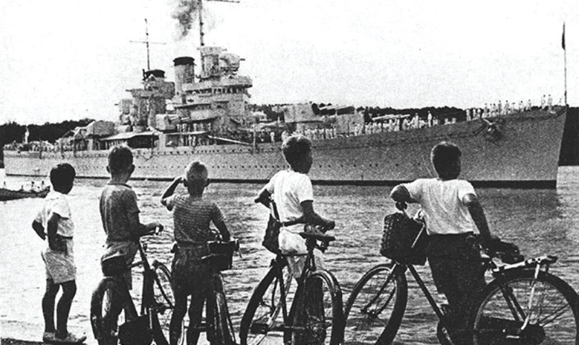 Warships in Bermuda watched by boys